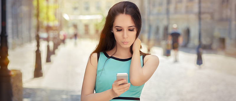 woman looking at phone